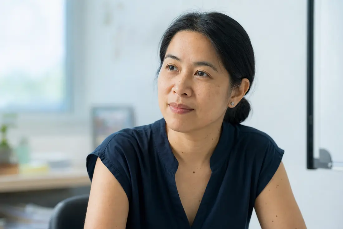Portrait of Mei Lin T., sample curriculum coordinator in the Netherlands.